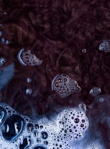 detergent-brown-liquid-with-blue-spume_23-2147933942